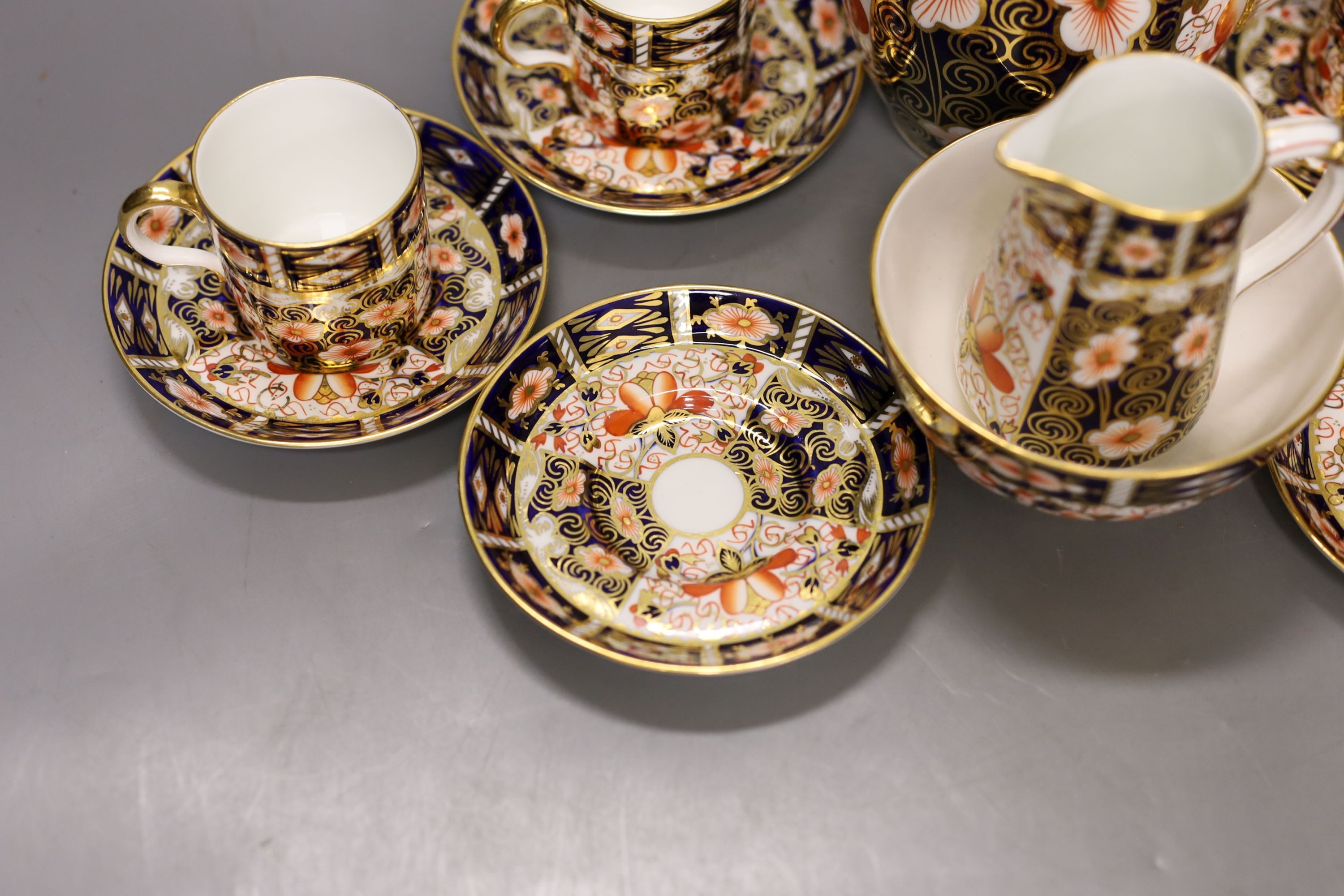 A Royal Crown Derby Imari pattern 2451 coffee set, comprising coffee pot, bowl jug and six cups and saucers.